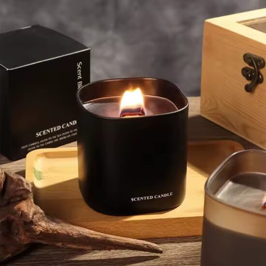 Soy wax scented candle with wooden wick in clear glass jar