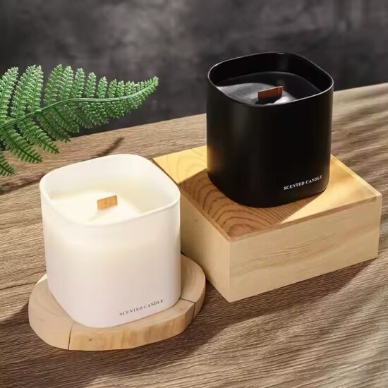 Soy wax scented candle with wooden wick in clear glass jar