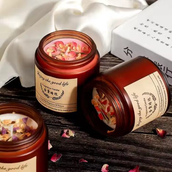 Luxury soy wax scented candle with dried flowers in glass jar