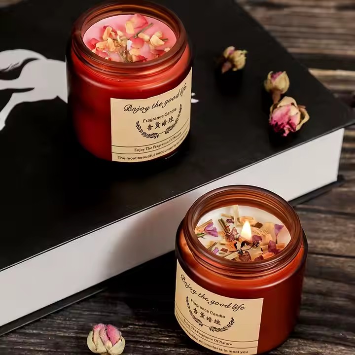 Luxury soy wax scented candle with dried flowers in glass jar