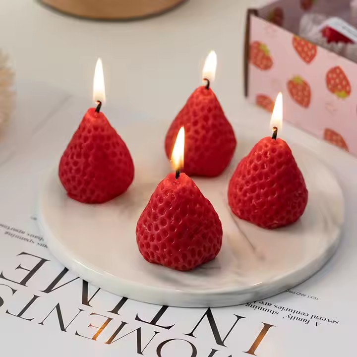 Strawberry scented eco soy wax candle in glass jar